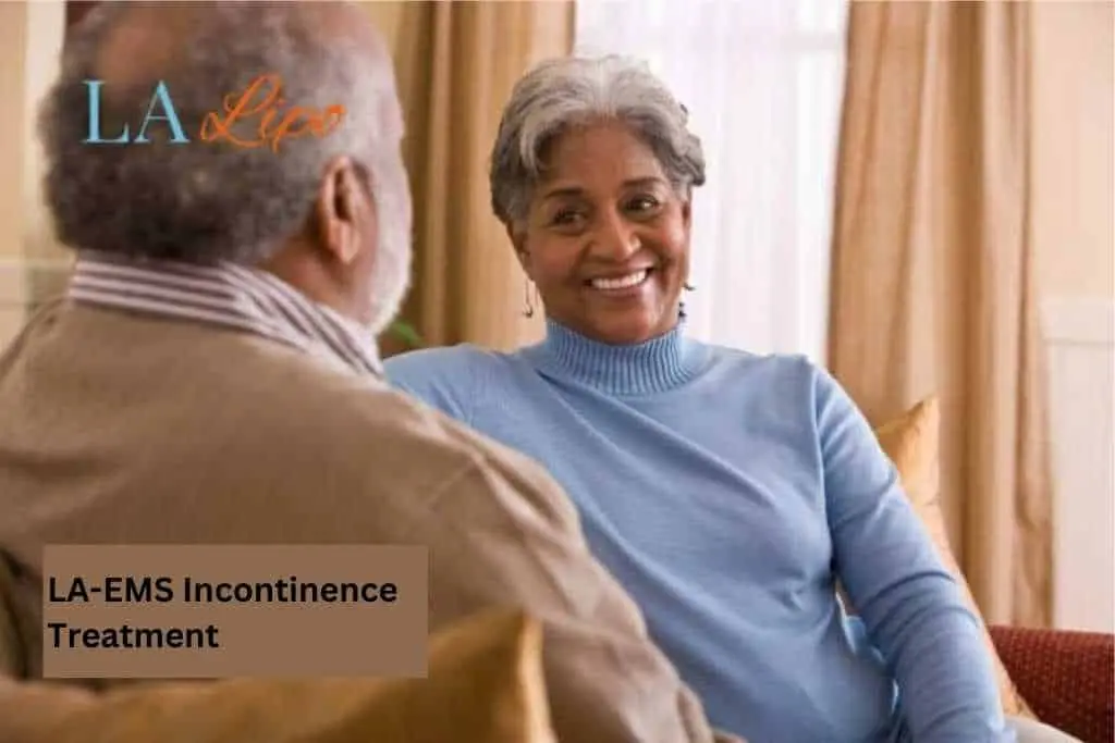 Couple sat smiling at each other - LA-EMS treatment Waltham Cross