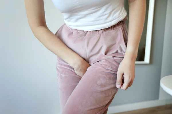 woman struggling with urine incontinence Waltham Cross