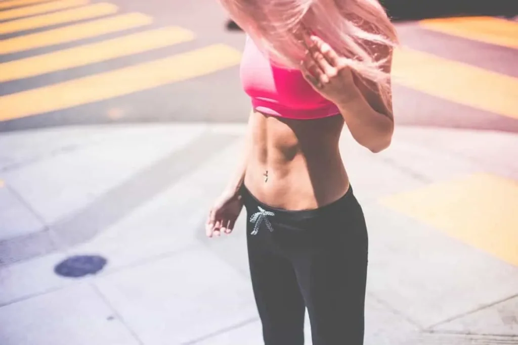 Woman with toned stomach after LA-EMS Body Sculpting Treatment Waltham Cross